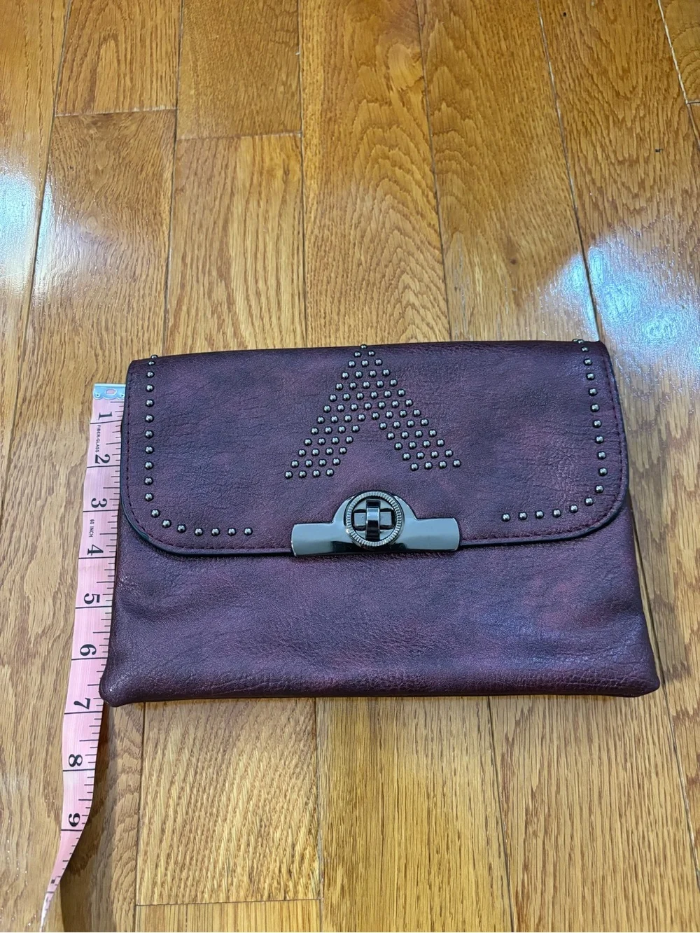 Studded Plum Leather Clutch with Turn-Lock Closure